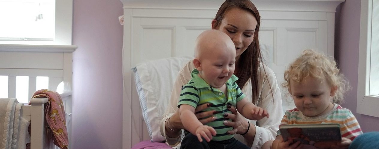 woman in family support center with children