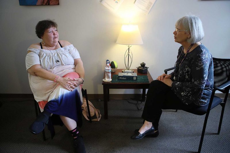 women speaking one on one