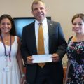 eastern bank giving supportive check to bridgewell