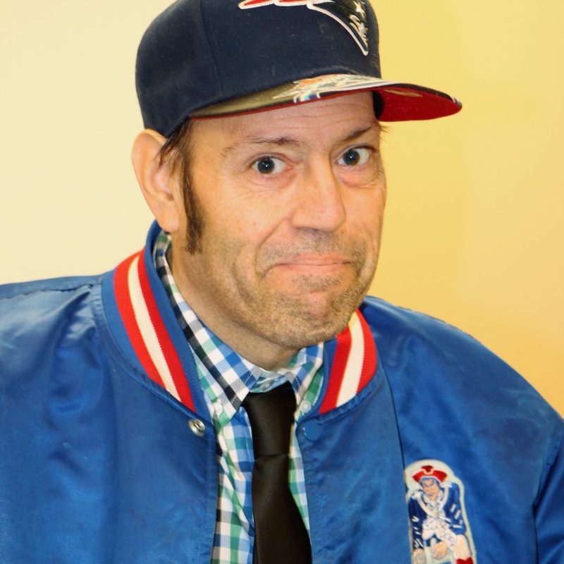 Happy man in new england patriots apparel